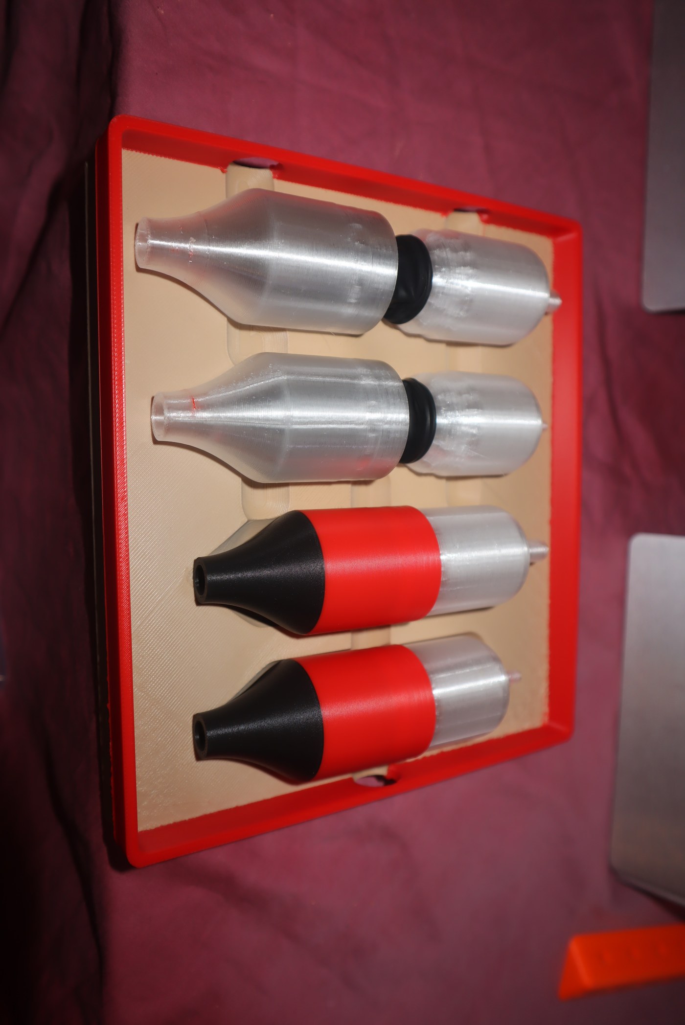 Low-Cost Air Isolator prototype — 3D-printed shells with clear tubing for sip-and-puff sensor isolation