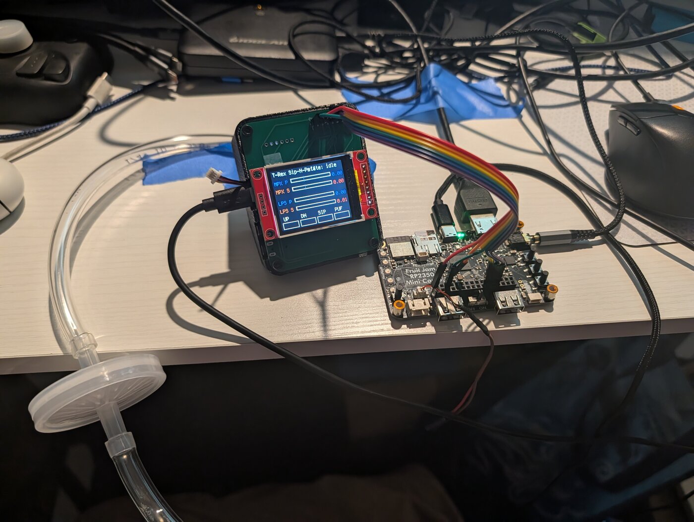 Sip-and-Puff alpha/beta prototype on the bench with live sensor readouts